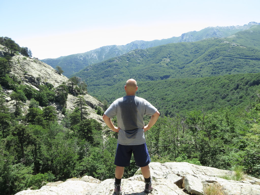 Yours truly pretending to pose like a man and show that we worked hard. You may enjoy the typical Corsican landscape at each side of the obstacle.