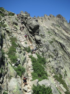 The GR20 requires some scrambling anc climbing here and there, but cables are put up for assistance. Note the pretty fracture zone that the path follows.