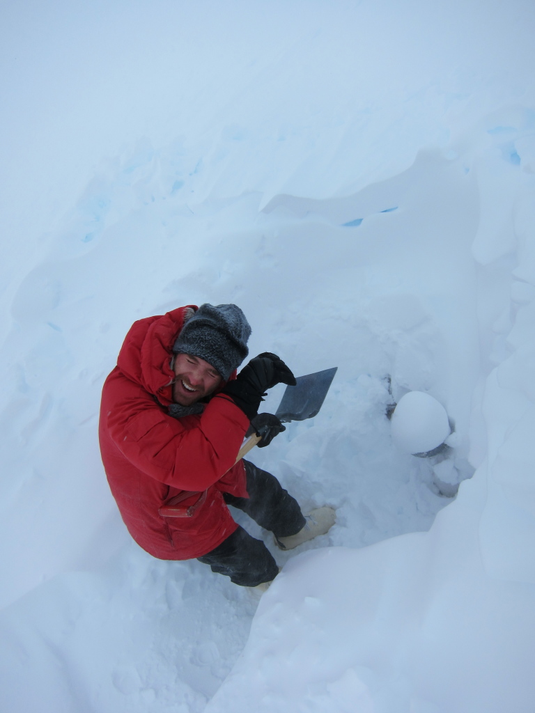 Figure 6. Shoveling out a drift-filled bathroom.