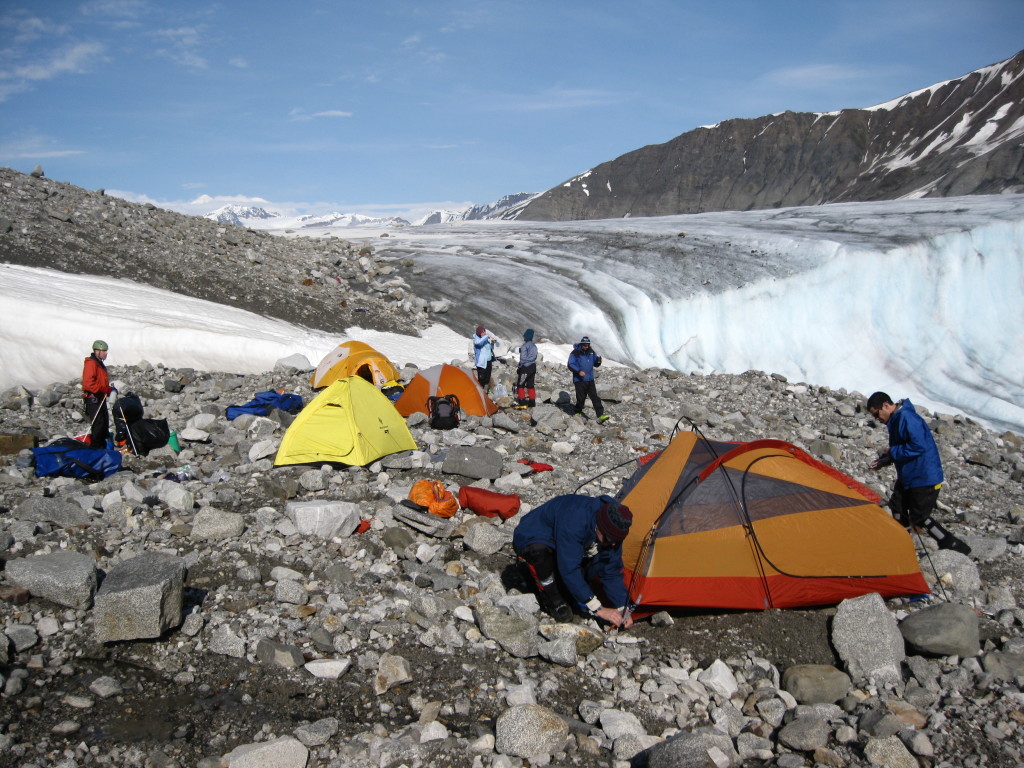 Our team of researchers setting up the 1st camp on a medial moraine on the West Fork Susitna Glacier. 