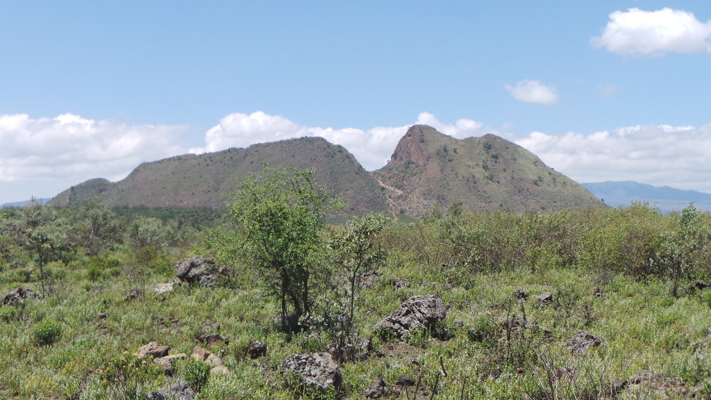 Sleeping Warrior, the depression in the crater rim clearly seen in the centre of the image, is part of a fault trace that can also be seen on the other side of the volcano.