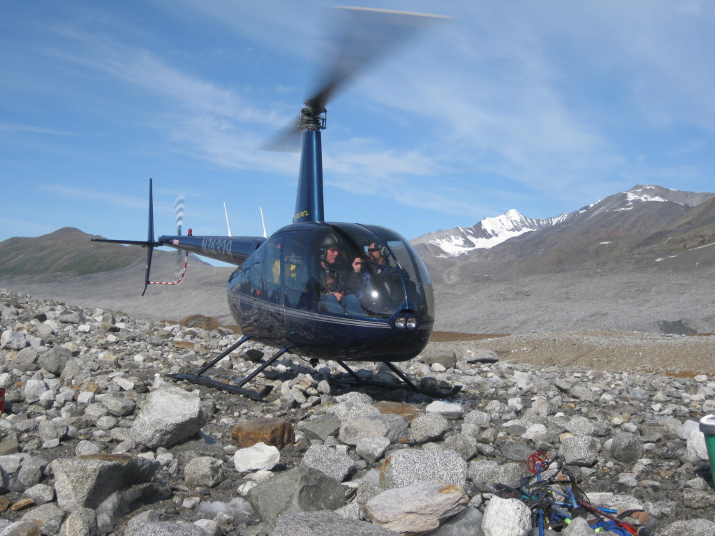 Helicopter take-off from on top of the ice-cored moraine at our 1st camp with Dr. Paul Fitzgerald and Dr. Jeff Benowitz headed to the Susitna Glacier.