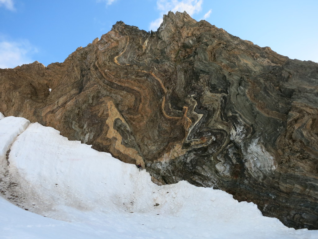 Strongly folded and faulted rocks of the middle-grade metamorphic unit on Prins Karls Forland. Note Maciek Manecki (175cm tall) at the bottom of the outcrop