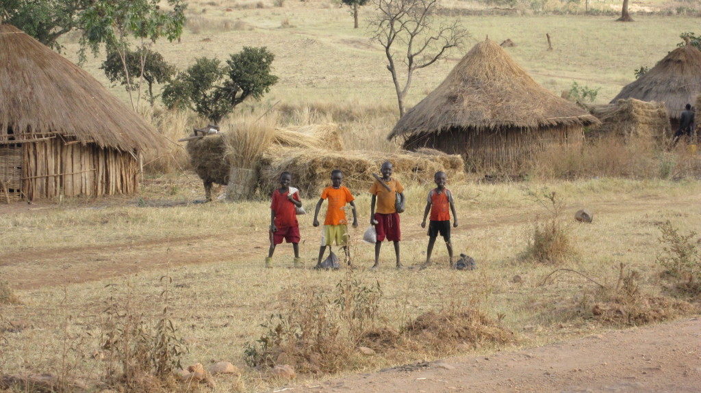 Happy children on the road to Guba