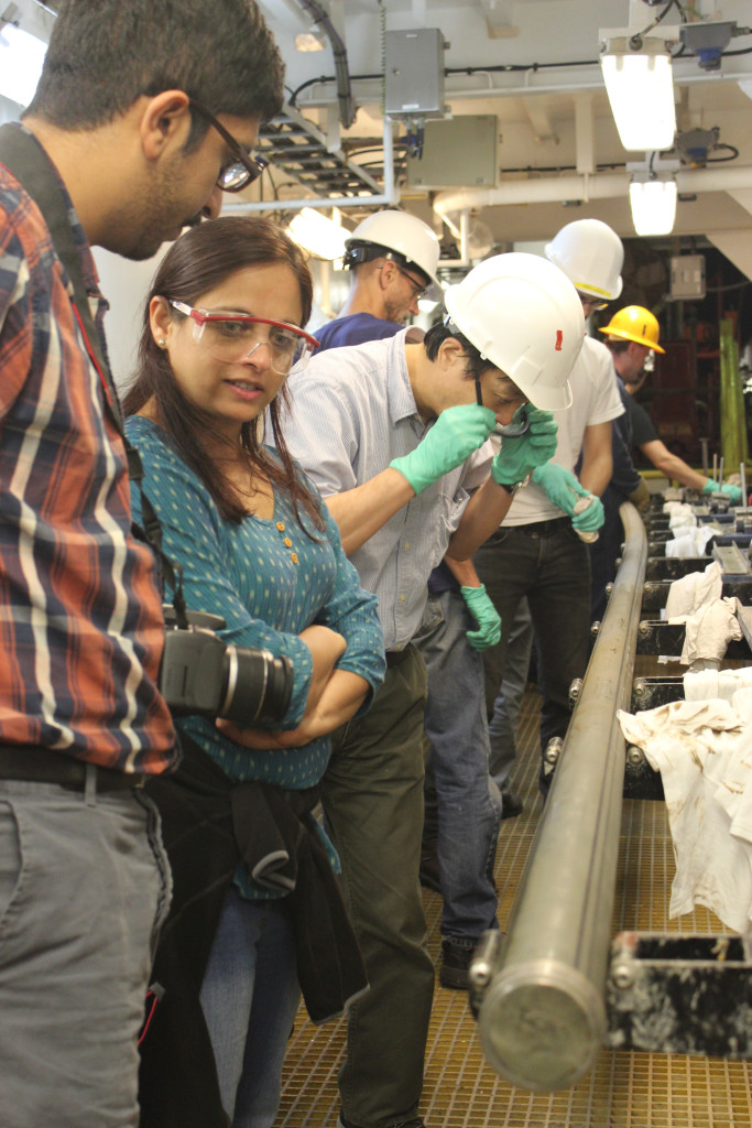 Scientists from the UK, USA and Japan examine the first core on deck