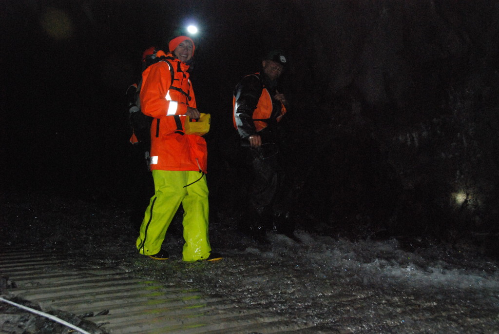 Tim and Susan surveying the Amethyst Hydro Tunnel in wet conditions.