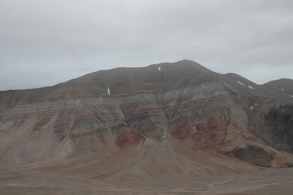 The Tricolorfjellet mountain in Billefjorden, Svalbard, with Carboniferous evaporites and eolian sandstone.
