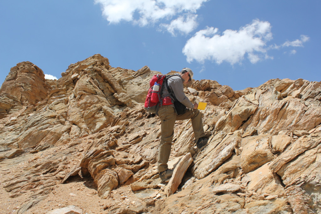 Andrew Laskowski conducting field work in the Lopu Range, photo by Dr. Paul Kapp.