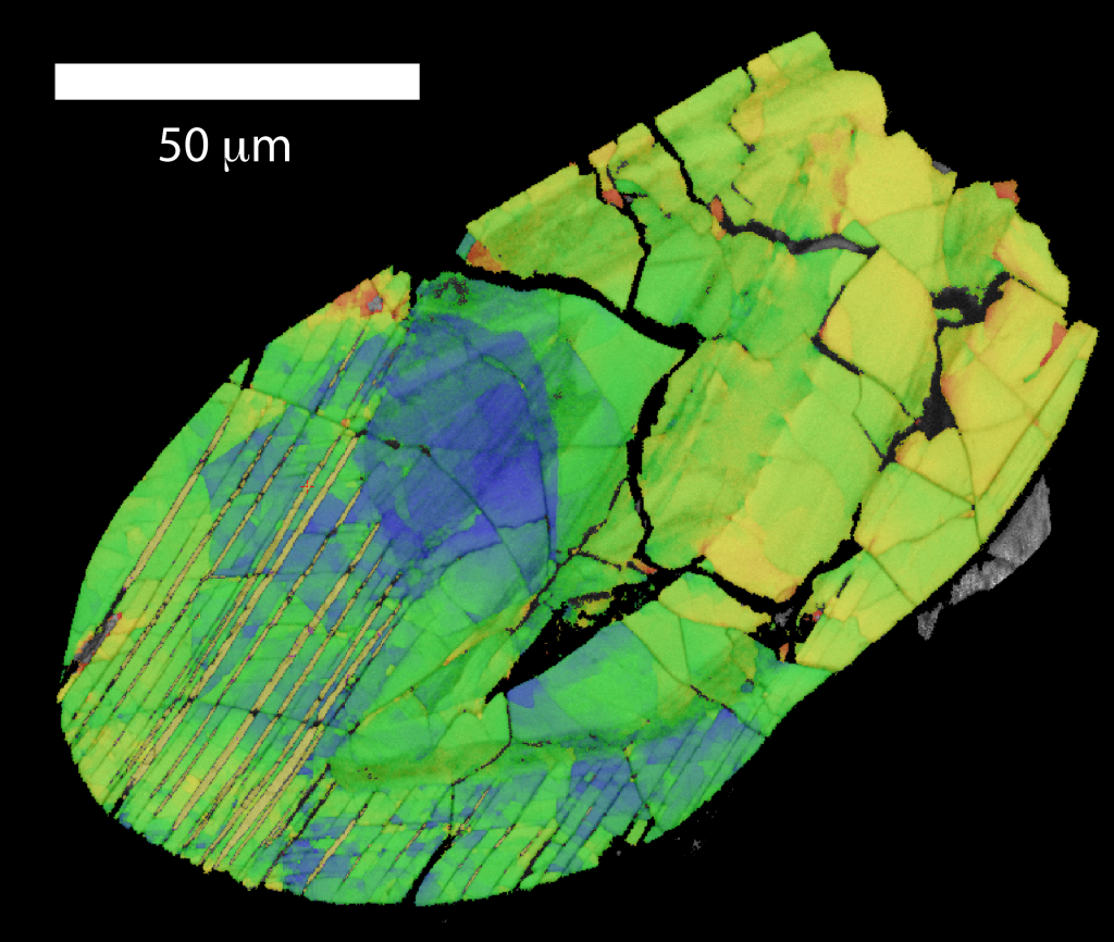 Fig. 5 – False-coloured image of a zircon grain containing thin lamellae of reidite (bottom left).