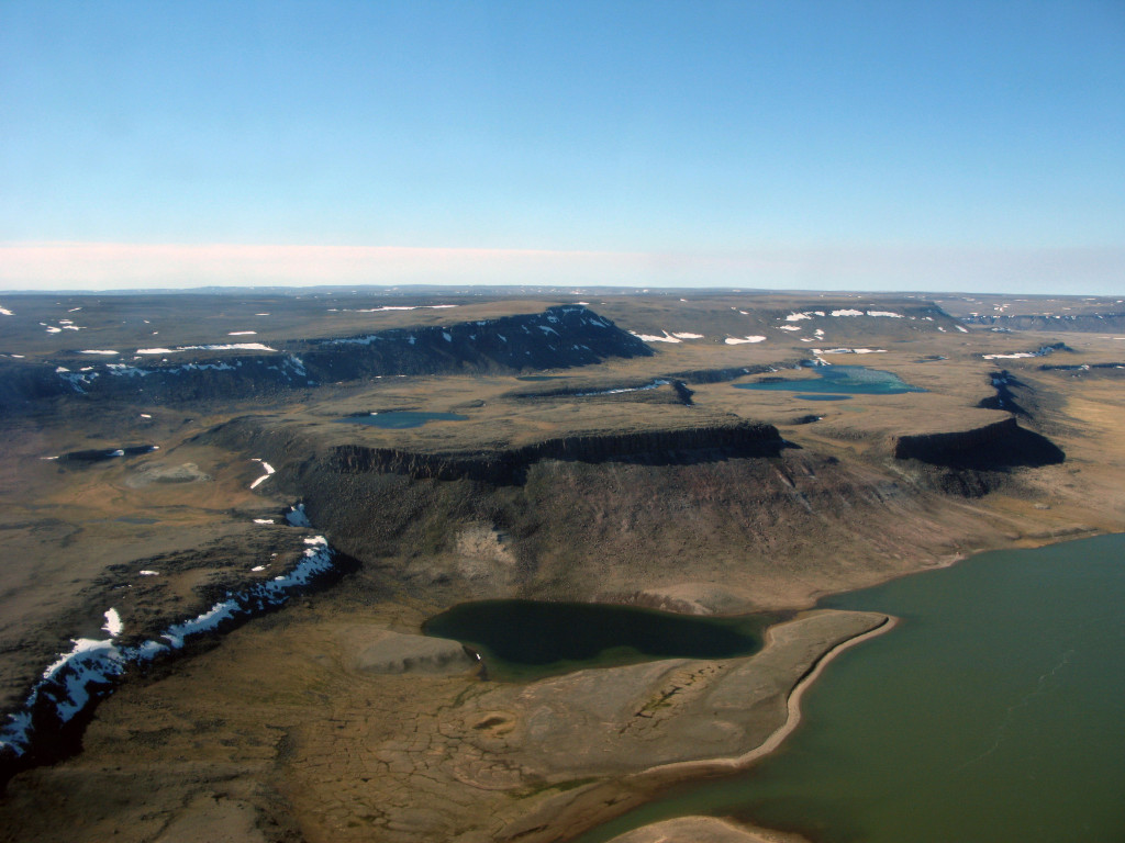 View from our ride to work: plateau in the foreground is a Franklin sill, and the plateau in the background is formed by the Kuujjua and Natkusiak Formations.