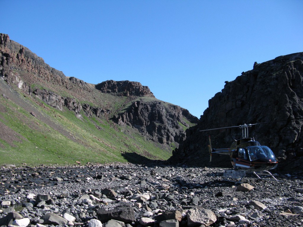 River cut through the Natkusiak Formation. Visible is one of the volcaniclastic units capped by thicker lavas.