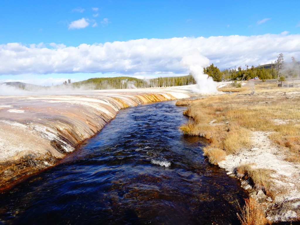 Another geyser plays on the bank of Iron Creek as we sample in the background.