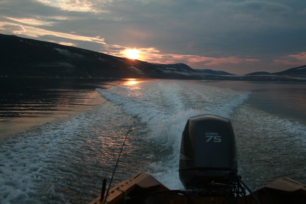 An Arctic sunset from the open ocean canoe as we make our way to basecamp.