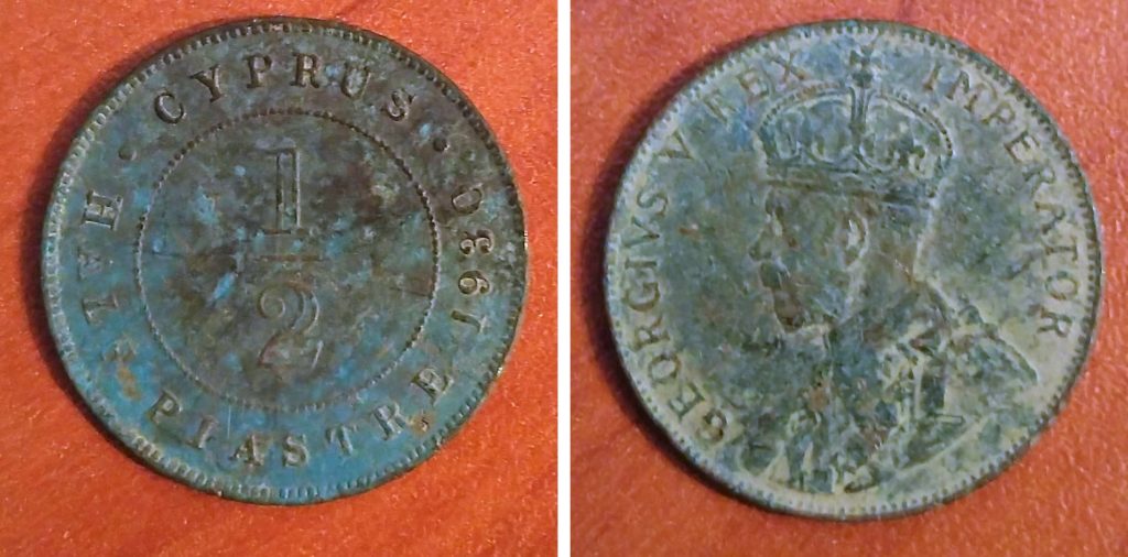 Caption: ½ Piastre coin from 1930. The text reads: GEORGIVS V REX IMPERATOR.