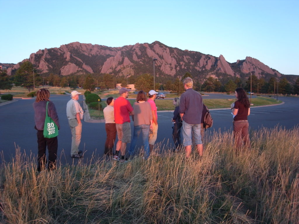 All of us enjoying the sunset at the Flatirons