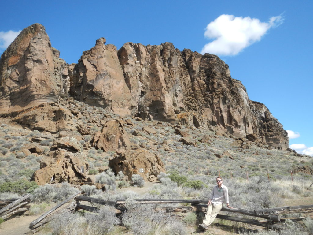 Matthew Nikitczuk in front of the Fort Rock monument. Photo by Nevena Novakovic.