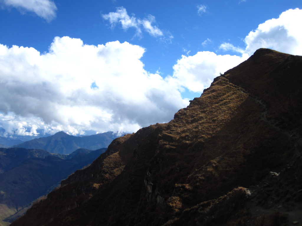 Photo 16: Collecting a rock sample near the highest structural levels of the Karnali klippe. Photo courtesy of Laurent Godin.