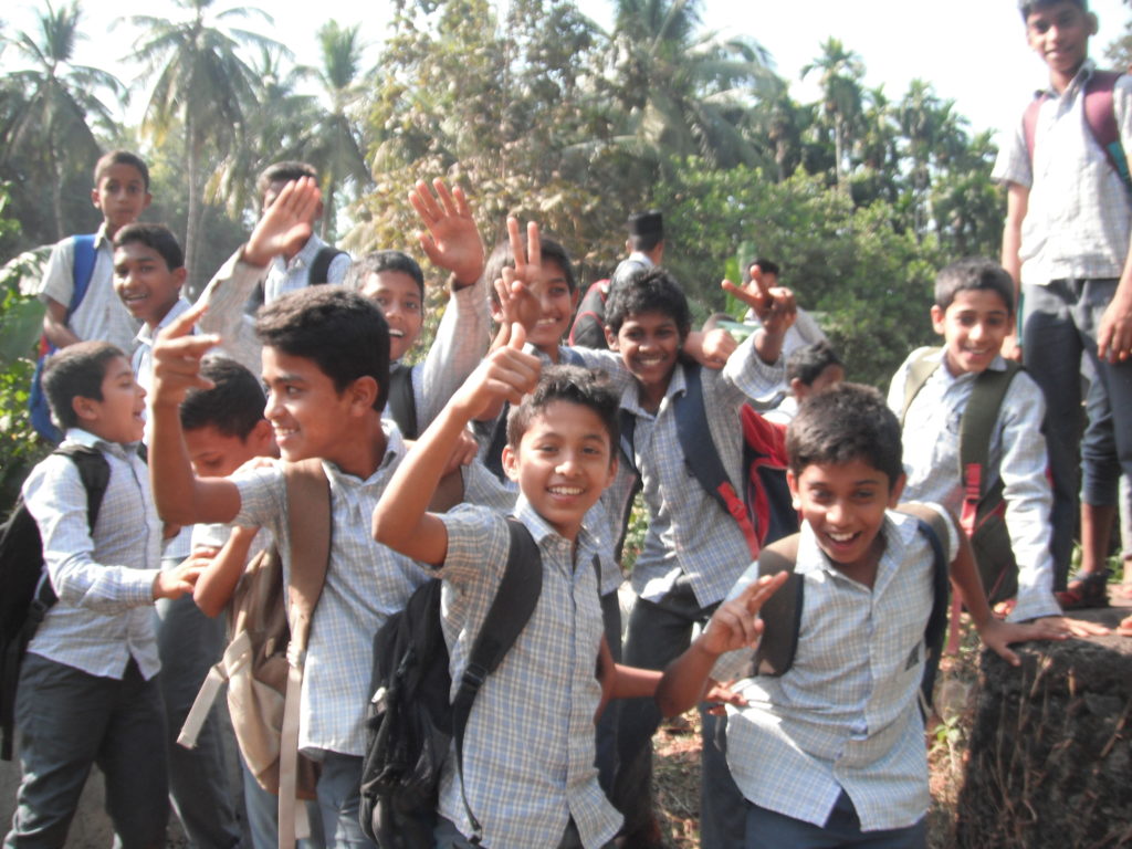 We were working in a creek bed just off a road when the local school had finished for the day. Our Indian colleagues told them we were filming a movie and that we were really famous actors from overseas. Suffice to say they were super excited when I asked if I could take this picture.