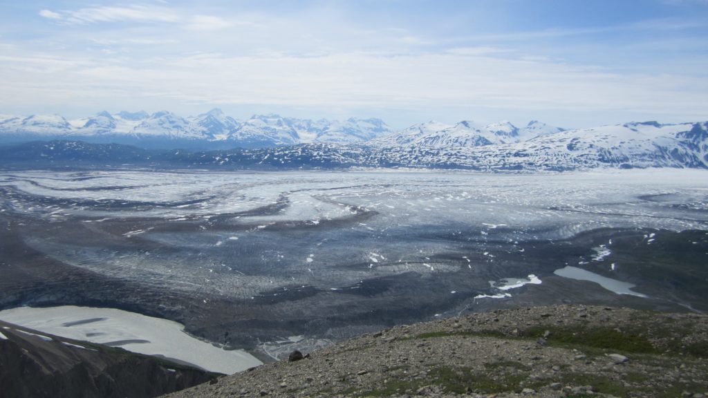 View of the Tweedsmuir Glacier flowing east before it drains into Alsek River.