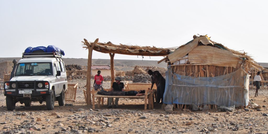 Our first stop in the Danakil was our basecamp at Berhale village where we slept on weaved beds in the shade of the huts that were occupied by the guards and guides.