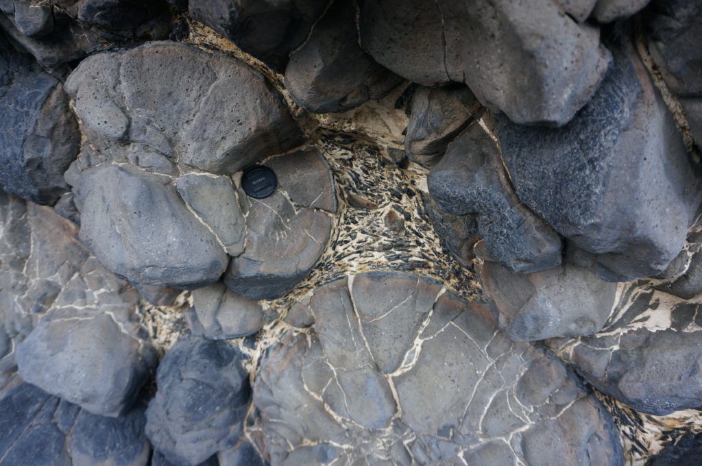 Coastal outcrop of the Oecusse Volcanics pillow basalts