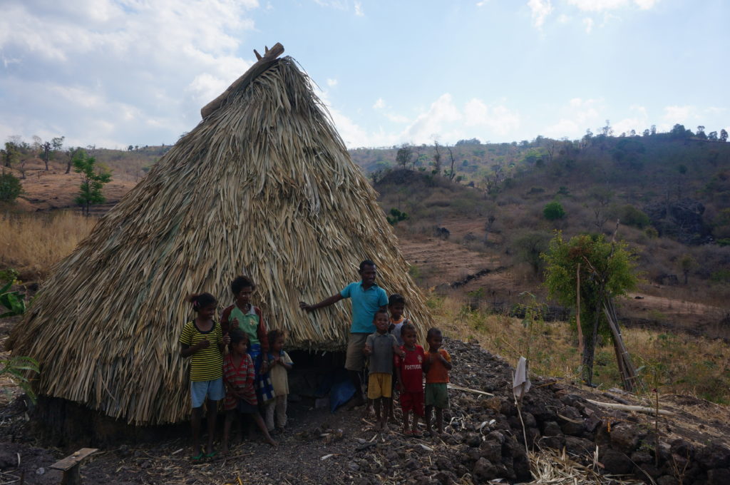 We asked if we could take a photo of the traditional Oecusse-style lopo house, but they decided to bring the whole family out